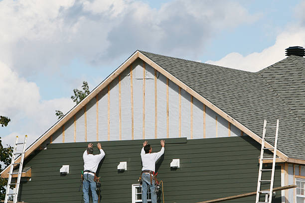 Professional Siding technician working in Hudson, CO